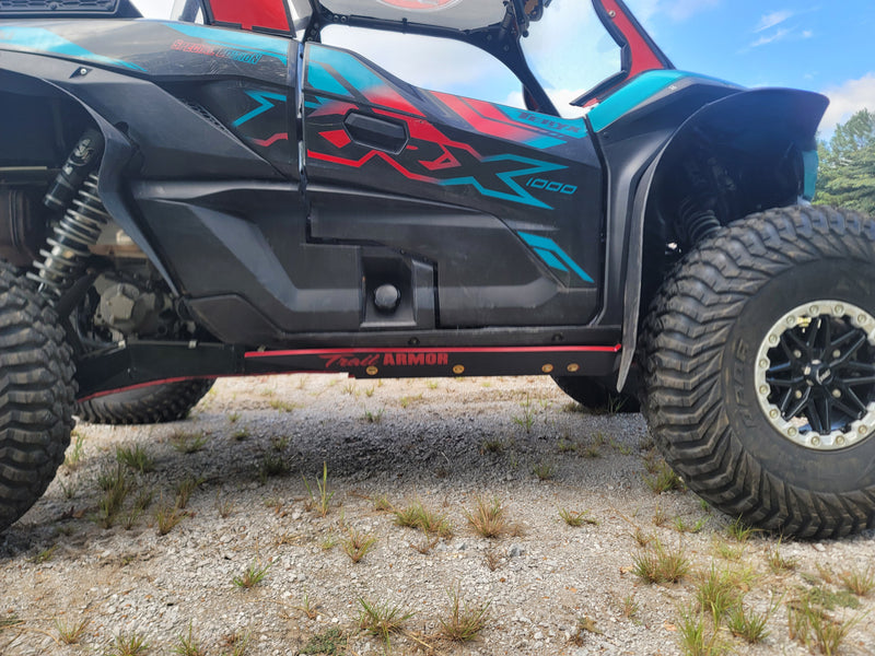 Trail Armor black slider nerf bar full side profile on Kawasaki KRX 1000 Special Edition outdoors