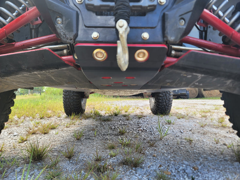 Trail Armor red front skid plate with winch hook front ground-level view on Kawasaki KRX 1000