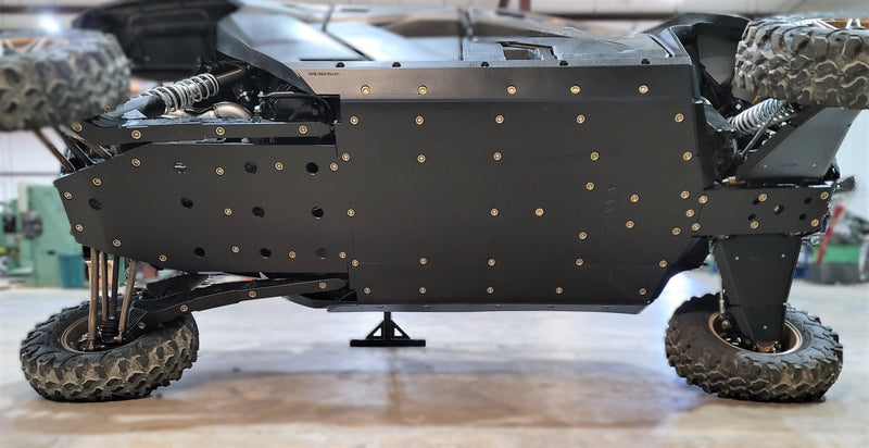 Trail Armor black full skids with integrated side skid plates side profile on Kawasaki KRX 4 1000 2023-2026