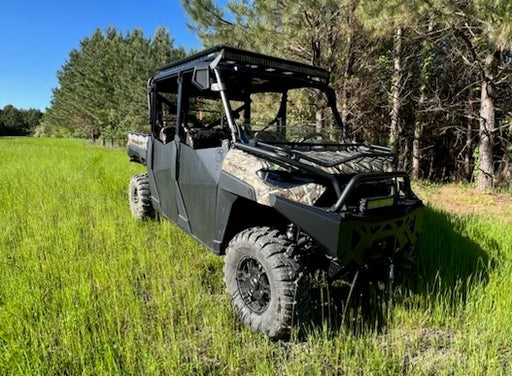 Trail Armor half doors on a Polaris Ranger Crew 1000 UTV front angle in a grass field