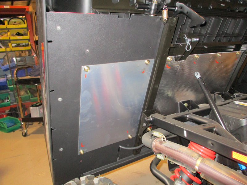 Under bed mud shield with factory heat shield