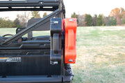 Trail Armor RotopaX mount with clamps holding packs on a Polaris Ranger roll bar