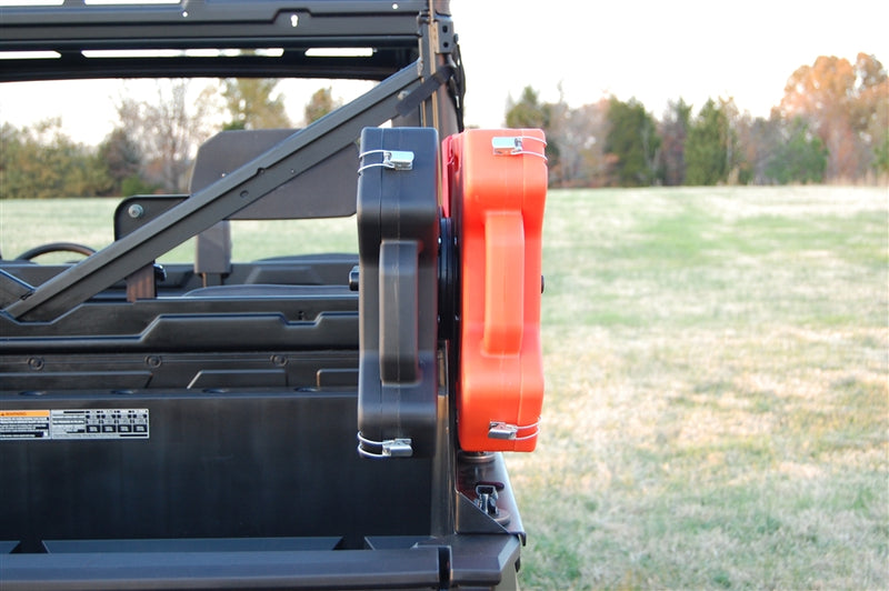 Trail Armor RotopaX mount with clamps holding packs on a Polaris Ranger roll bar