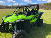 Trail Armor mud flap fender extensions front three quarter outdoor view on green Honda Talon 1000R UTV