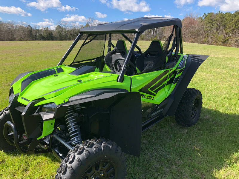 Trail Armor mud flap fender extensions front three quarter outdoor view on green Honda Talon 1000R UTV