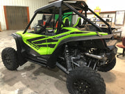 Trail Armor mud flap fender extensions installed on green Honda Talon 1000R UTV full side view