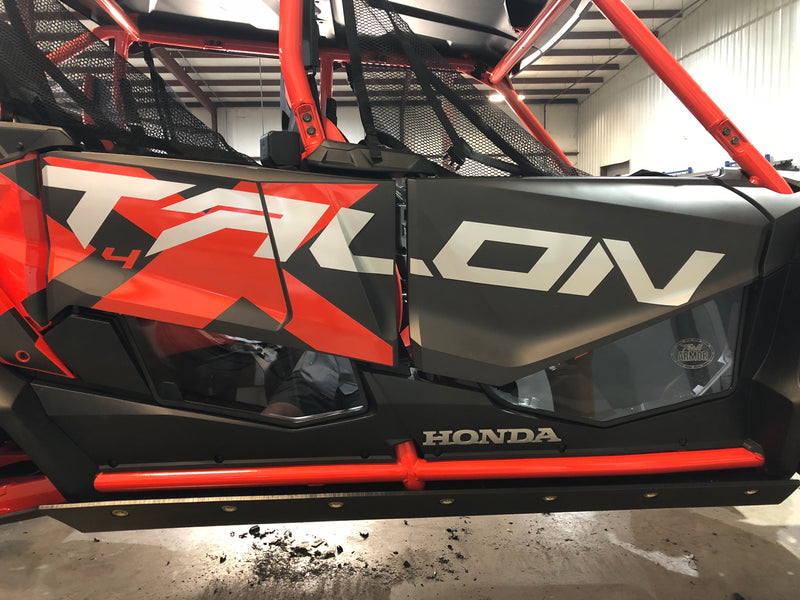 Trail Armor lower door insert kit installed on red Honda Talon 1000X-4 Live Valve 4-seat UTV door panel