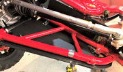 Trail Armor iMpact front A-arm guards installed on red Honda Talon 1000X XS X-4 Fox Live Valve undercarriage
