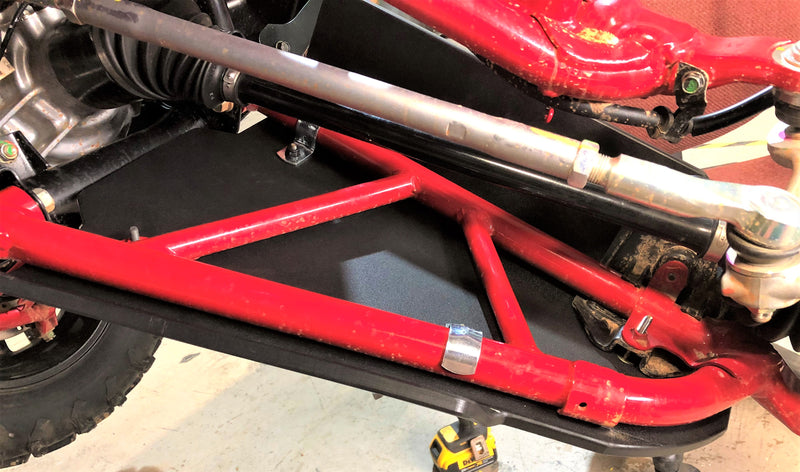 Trail Armor iMpact front A-arm guards installed on red Honda Talon 1000X XS X-4 Fox Live Valve undercarriage