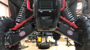 Trail Armor iMpact front A-arm guards undercarriage view with logo badges on Honda Talon 1000X XS X-4 Fox Live Valve