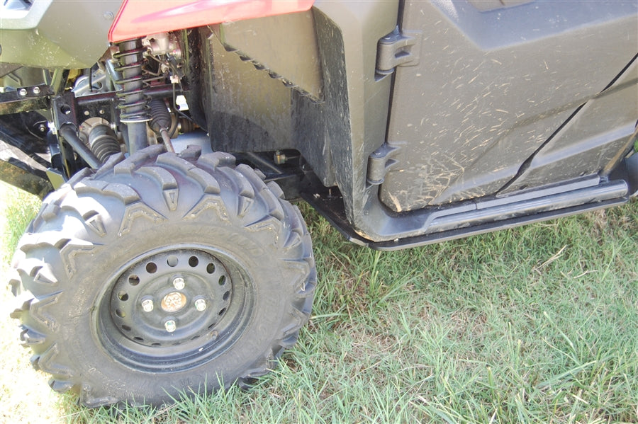 Trail Armor Honda Pioneer 700 Full Skid Plate Installed – Front Wheel and Rocker Panel Corner View with Suspension