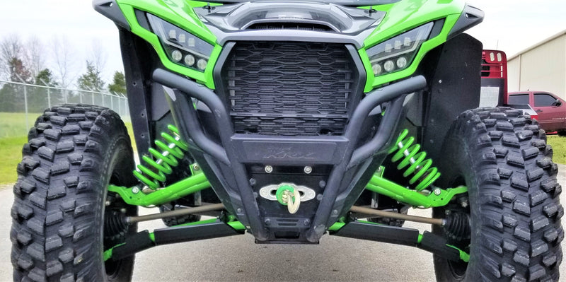 Trail Armor black iMpact Front Guards straight-on front view with winch on Kawasaki KRX 1000 outdoors