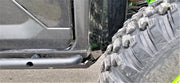 Trail Armor black integrated slider nerf bar side close-up fitment on Kawasaki KRX 1000