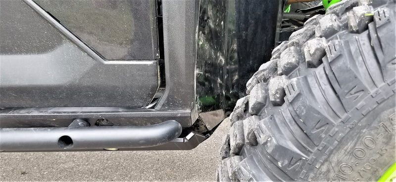 Trail Armor black integrated slider nerf bar side close-up fitment on Kawasaki KRX 1000