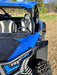 Trail Armor black mud flap fender extension front quarter view on Kawasaki KRX 1000 2020-2026 outdoors