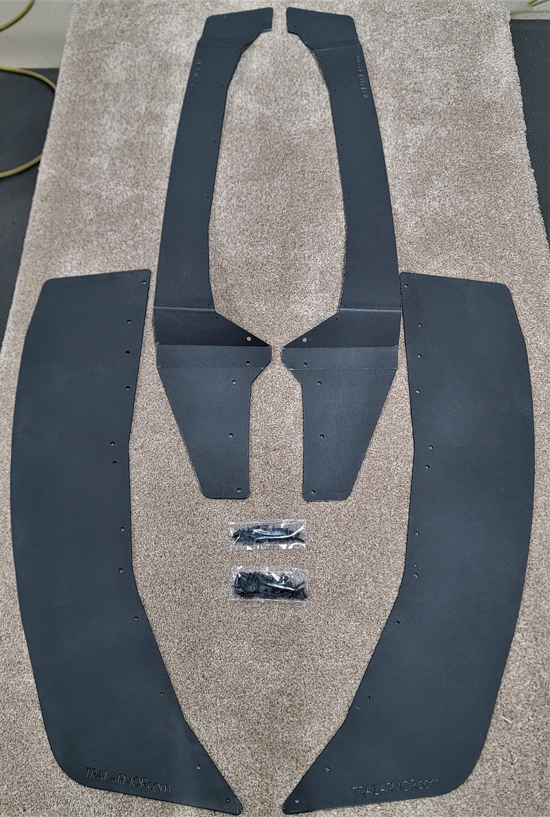 Trail Armor black mud flap fender extensions complete 4-piece kit with hardware flat lay KRX 1000