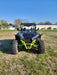 Trail Armor black mud flap fender extensions straight-on front view on Kawasaki KRX 1000 neon build
