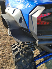 Trail Armor black rear mud flap fender extension with tail lights and coilover on Kawasaki KRX 1000