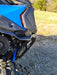Trail Armor black rear mud flap fender extension underside view near exhaust on Kawasaki KRX 1000