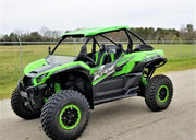 Trail Armor skid plates on Kawasaki Teryx KRX 1000 UTV side view outdoors
