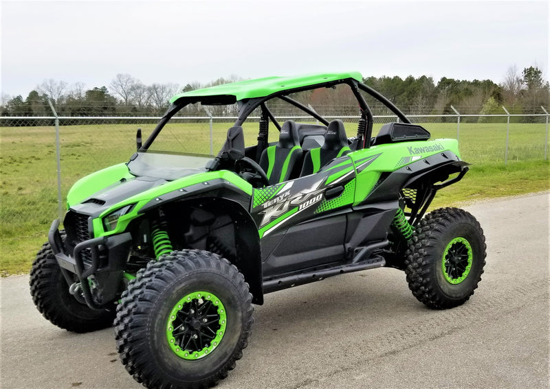 Trail Armor skid plates on Kawasaki Teryx KRX 1000 UTV side view outdoors

