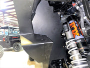 Trail Armor black inner fender liner installed on Kawasaki KRX 4 1000 alongside FOX Podium RC2 shock