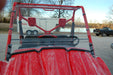 Trail Armor Kawasaki Teryx CoolFlo Windshield installed on 2008 2009 model front view in red