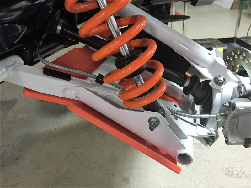 Trail Armor iMpact A-Arm Guard fitment near Polaris General coilover suspension