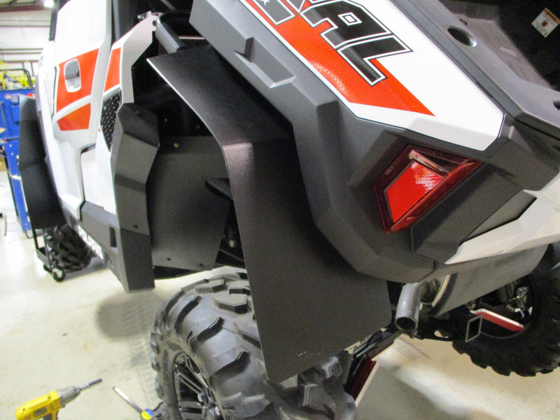 Trail Armor mud flap fender extension closeup install on Polaris General rear
