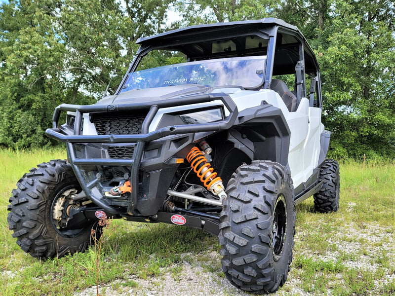 Trail Armor full skid plate installed on white Polaris General 4 outdoors