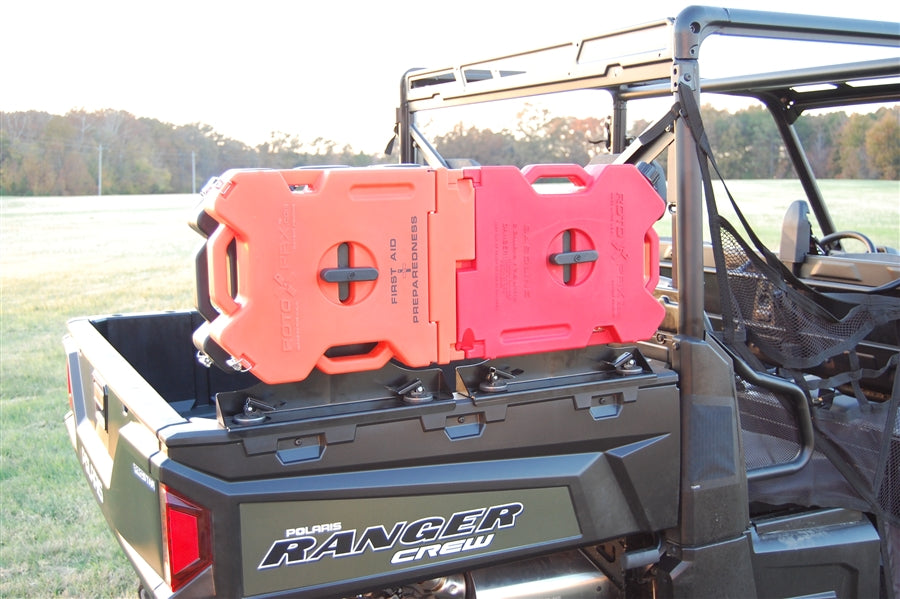 Trail Armor RotopaX mount with first aid and fuel packs on a Polaris Ranger Crew tailgate