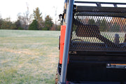 Trail Armor RotopaX mount holding an orange fuel pack on a Polaris Ranger bed rack