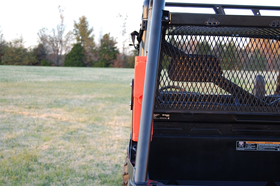 Trail Armor RotopaX mount holding an orange fuel pack on a Polaris Ranger bed rack