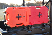 Trail Armor RotopaX mount close up with first aid and gasoline packs on a Ranger tailgate