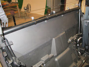 Trail Armor rear window dust shield side angle view near Polaris RZR seats