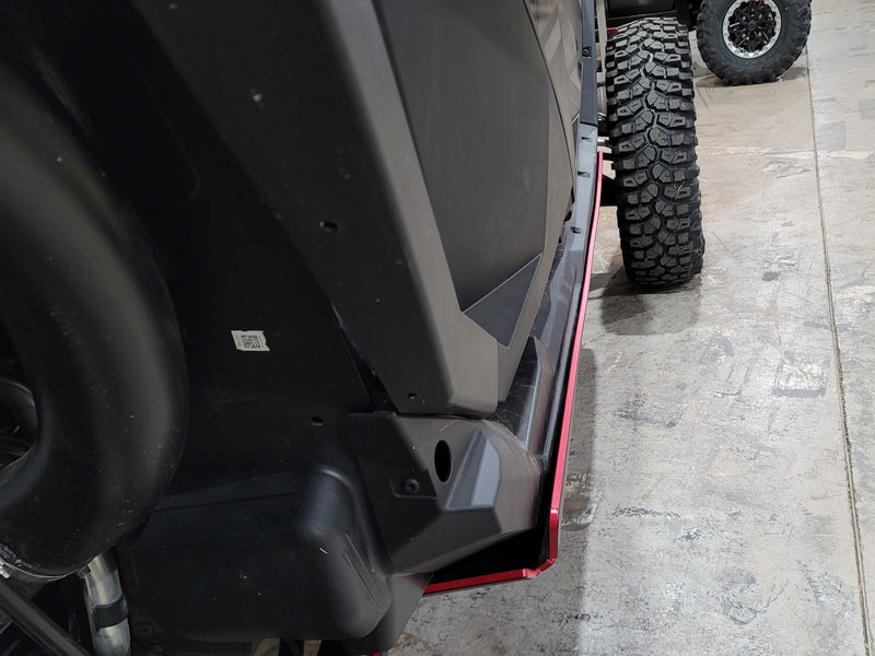 Close-up of Trail Armor rocker panel guard fitment on Polaris RZR Pro R 4