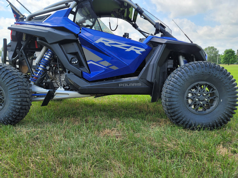 Blue Polaris RZR Pro R with Trail Armor skid plate, full side profile view