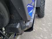 Close-up of Trail Armor rocker panel guard on Polaris RZR Pro R door area