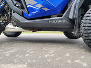 Trail Armor rocker panel guard installed on blue Polaris RZR Pro R side