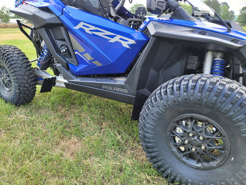 Trail Armor skid plate installed on blue Polaris RZR Pro R side view