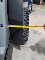 Checking tire-to-fender clearance on Trail Armor Polaris RZR Pro XP flare