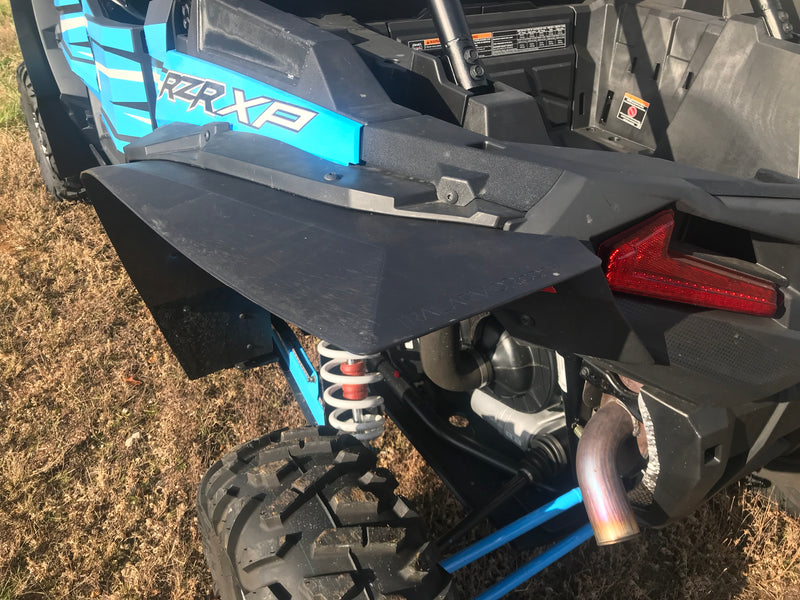 Close-up of Trail Armor mud flap fender extension on Polaris RZR XP 1000