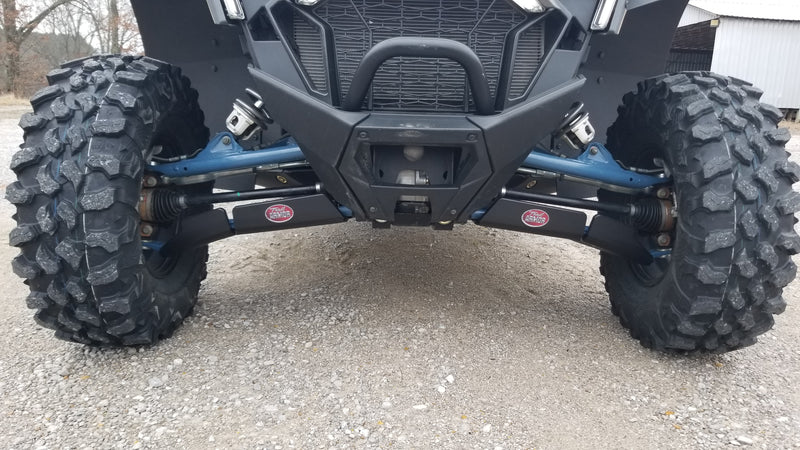 Trail Armor A-arm guards installed on Polaris RZR XP Pro 4 front suspension