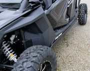 Close-up of Trail Armor nerf bar and skid plate on Polaris RZR XP Pro 4
