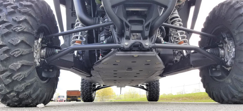 Trail Armor rear skid plate installed under Polaris RZR XP Pro 4 chassis