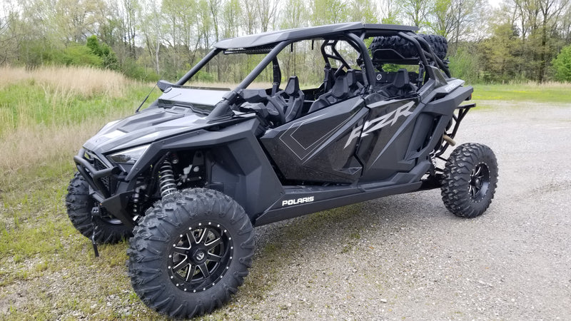 Trail Armor skid plate installed on black Polaris RZR XP Pro 4 side-by-side