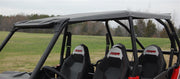 Trail Armor hard top roof installed on Polaris RZR XP 4 1000, passenger side view showing seats