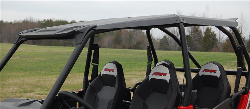 Trail Armor hard top roof installed on Polaris RZR XP 4 1000, passenger side view showing seats
