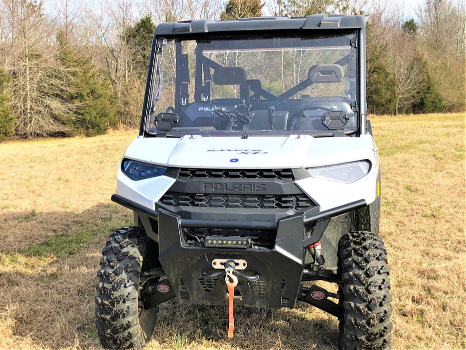 Trail Armor Ranger XP 1000 factory arched A-Arm guard installed, front vehicle view with logo
