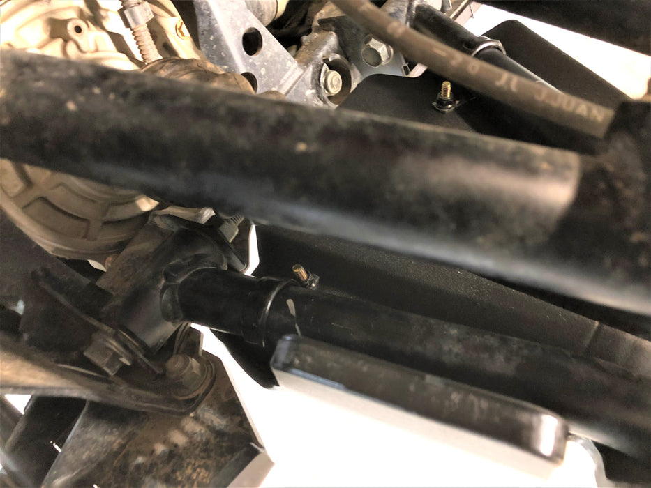 Trail Armor Ranger XP 1000 factory arched A-Arm guard mounting hardware closeup near CV joint
